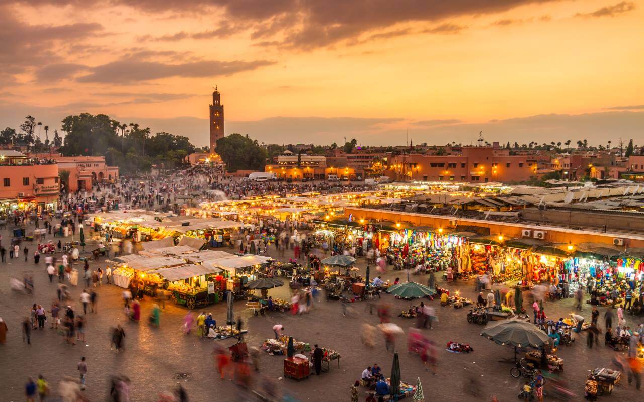 Conciergerie à Marrakech : L'alliée des propriétaires pour des séjours inoubliables pour les voyageurs. Conciergerie Marrakech - La Ville de Marrakech au couché au soleil